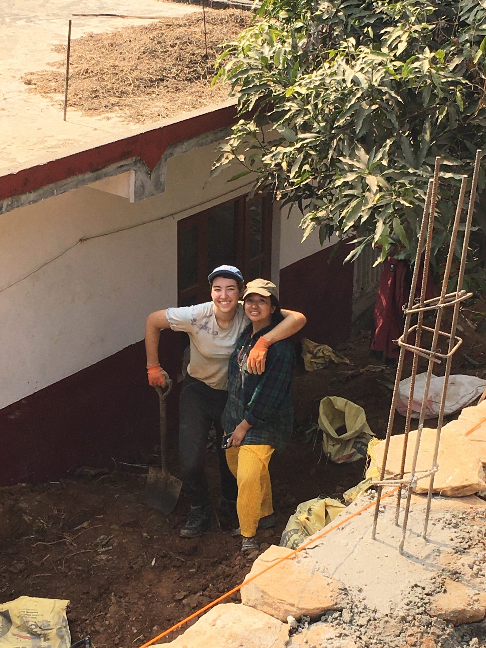 Volunteer helping build the center